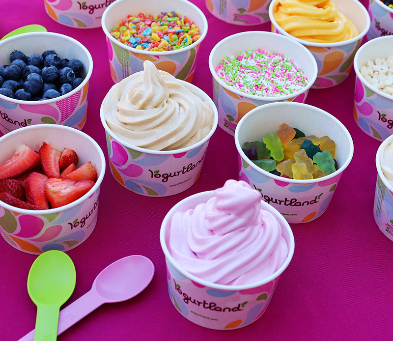 A variety of cups of Yogurtland frozen yogurt.