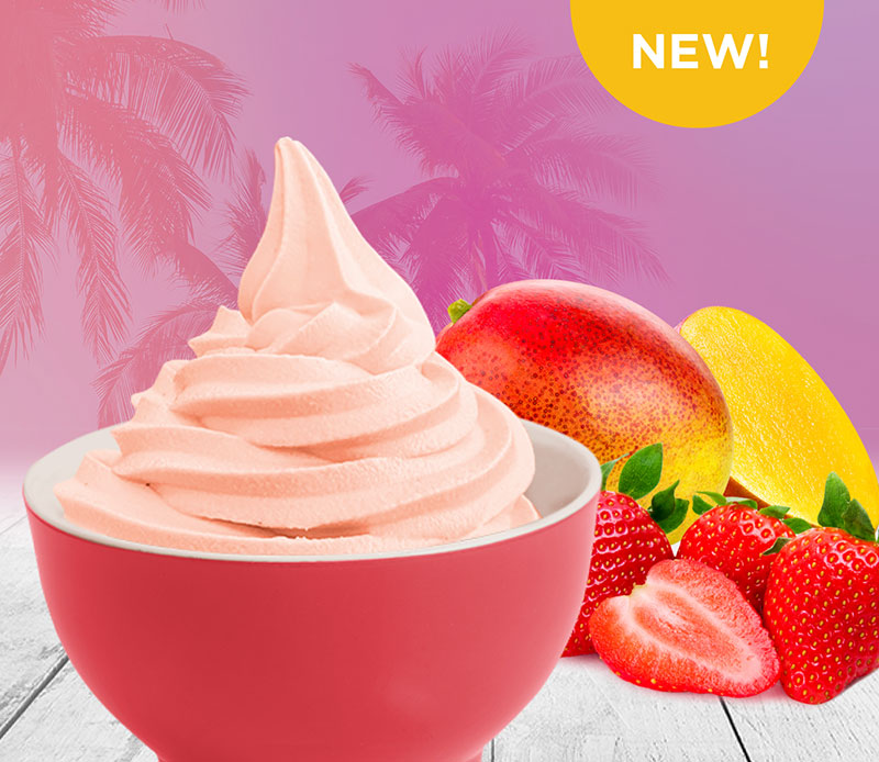 Yogurtland frozen yogurt alongside strawberries and mango.